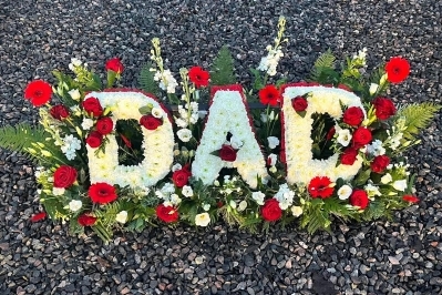 Based letters in a garden